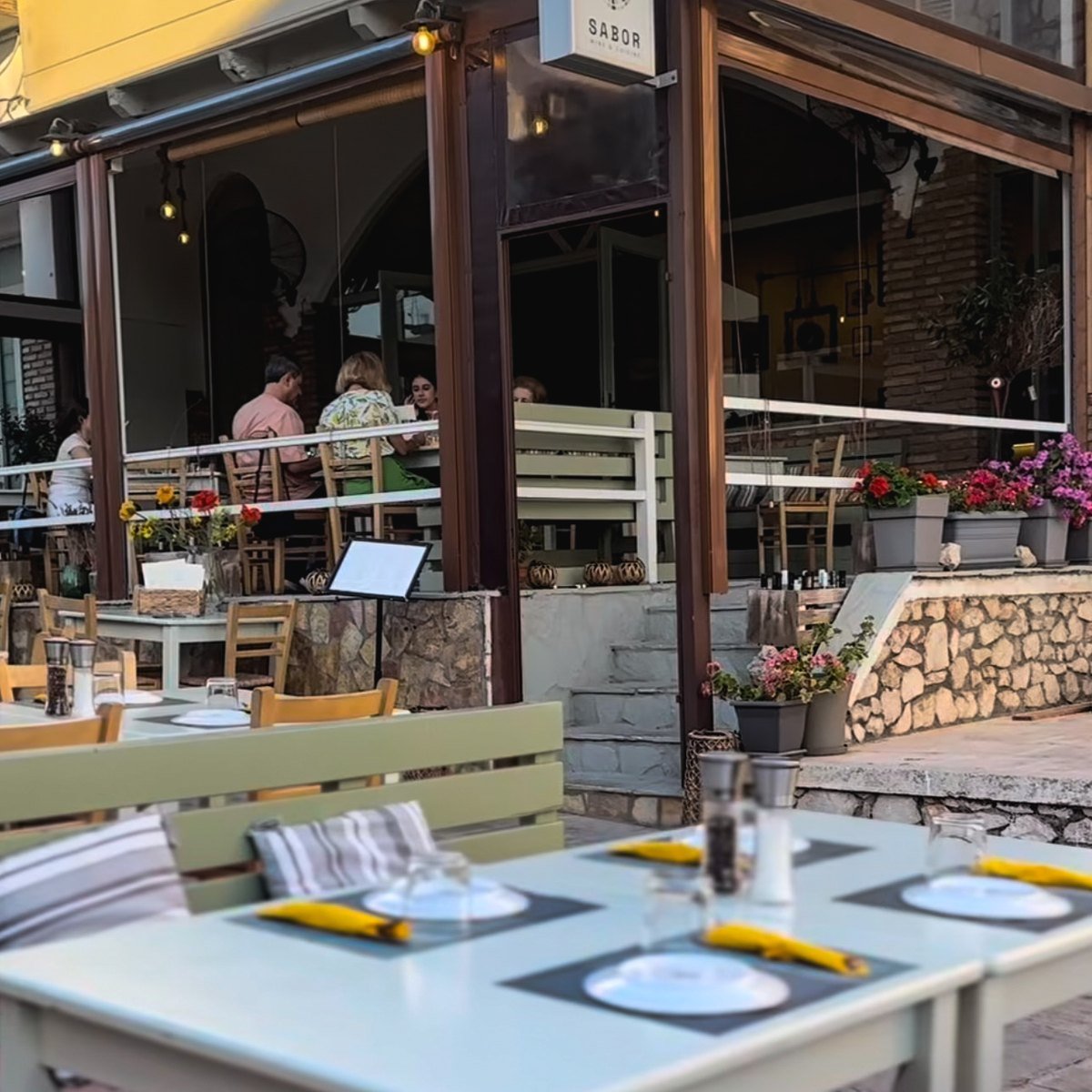 The terrace and the front of SABOR on a summer afternoon